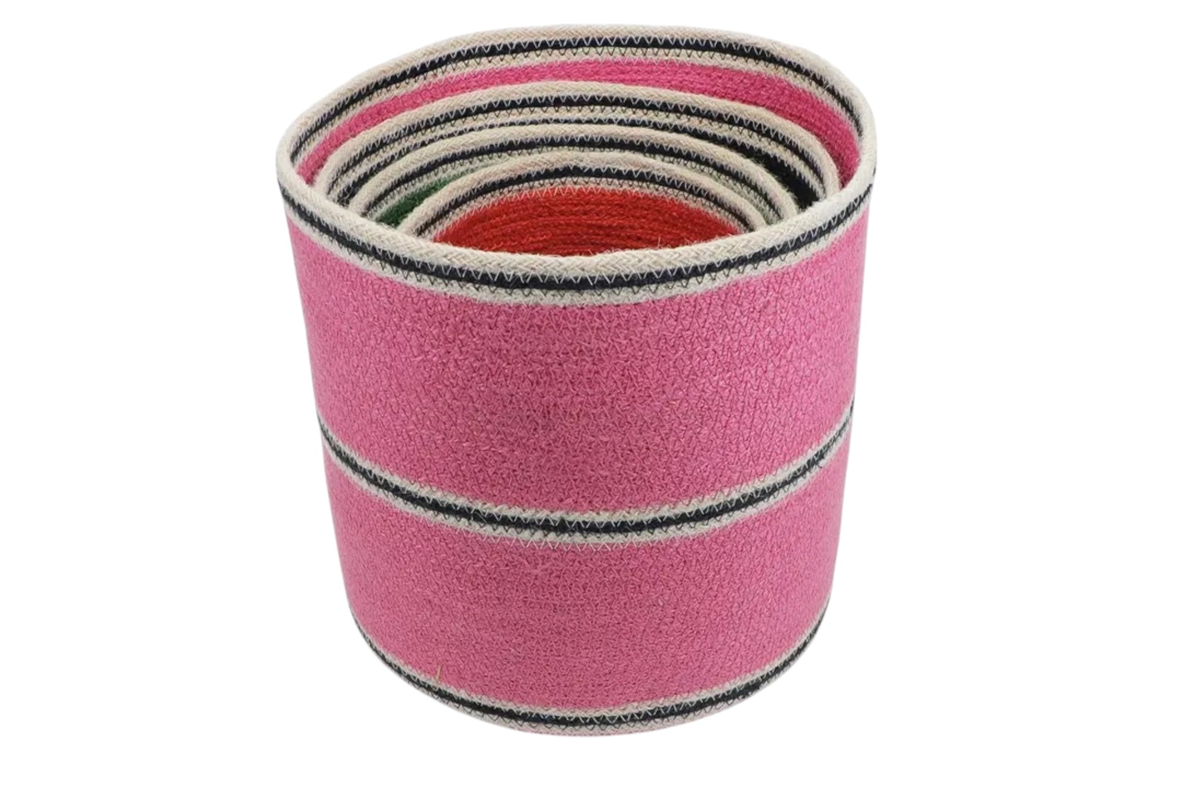 A set of four round jute storage baskets in graduated sizes and colours. Set against a white background.