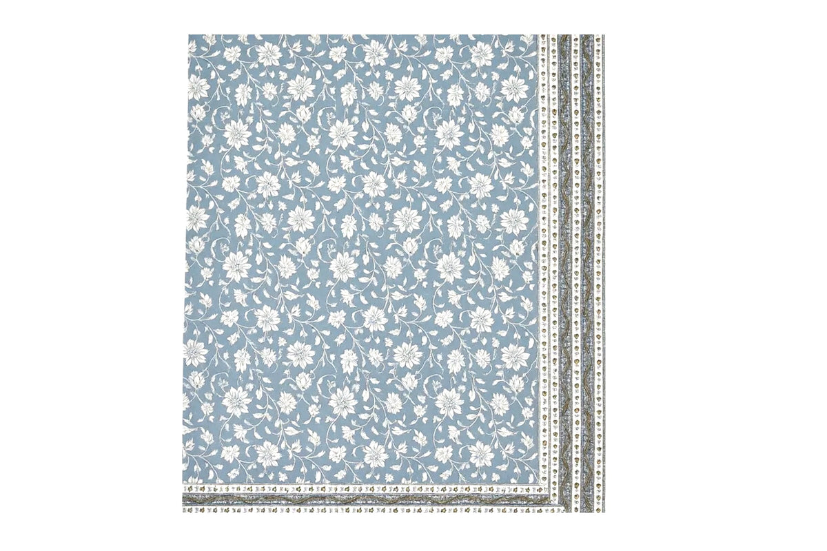 FINCHCRAFT cotton table cover in blue with a white floral vine pattern and a decorative block-printed border.
