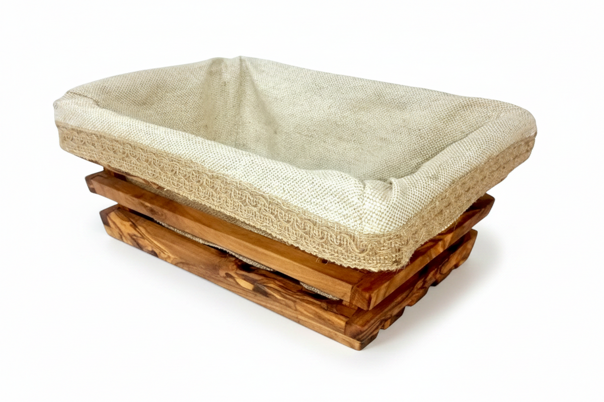 FINCHCRAFT rectangular olive wood bread basket with a removable beige linen liner featuring rustic trim