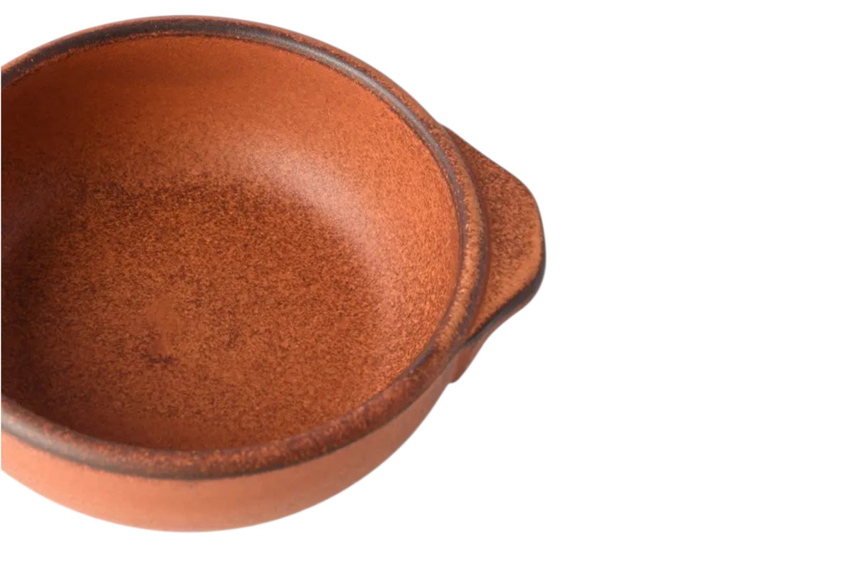 FINCHCRAFT small orange Minoyaki porcelain donabe pot with side handles for individual cooking and table presentation.