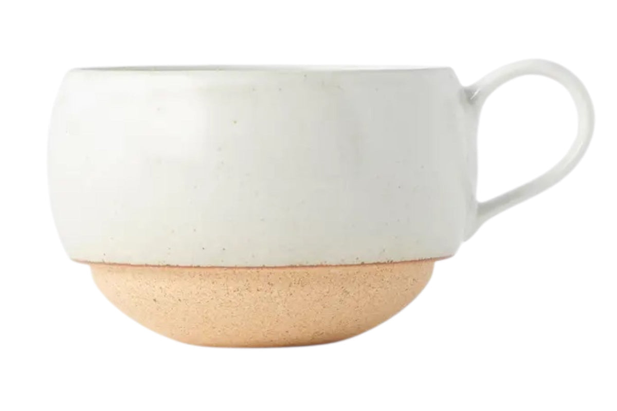 FINCHCRAFT rounded earthenware mug with a smooth white glazed upper and an exposed natural clay base.