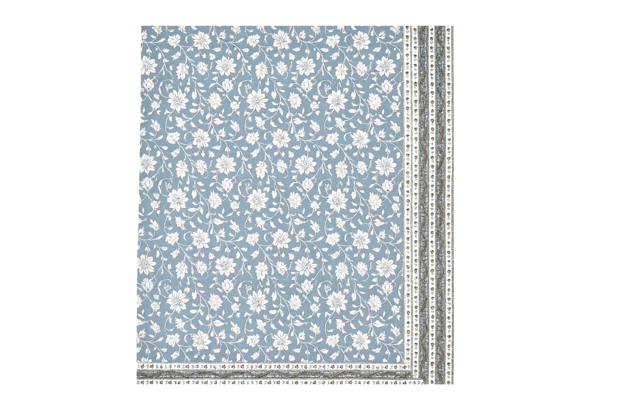 Azure blue table cover with a vine design on a white background.