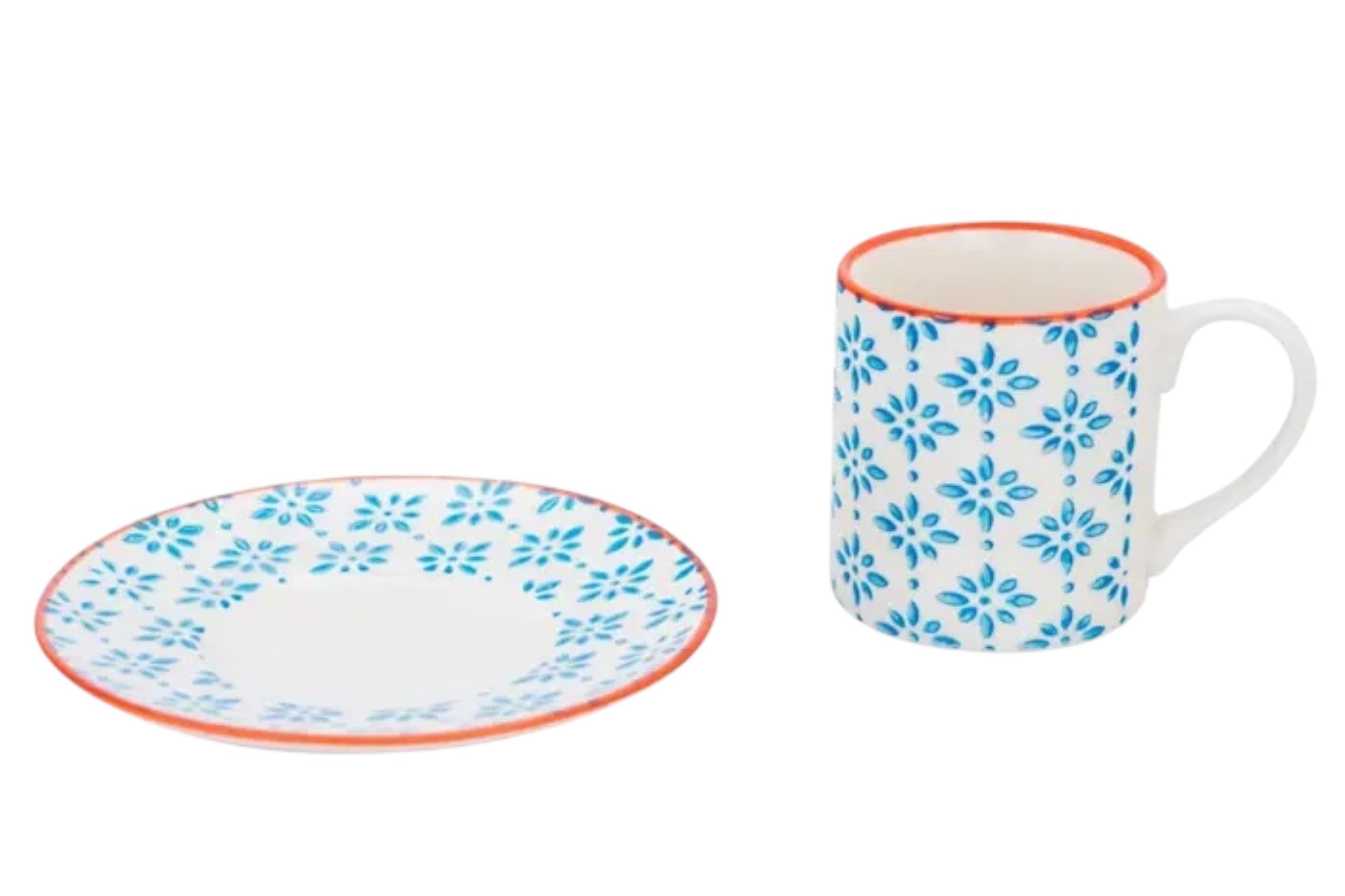 A porcelain espresso cup and saucer with a blue patterned finish and subtle orange accents, ictured on a white background.