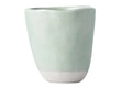 A hand-finished ceramic mug with a softly irregular form and pale tomei blue glaze set against a white background.