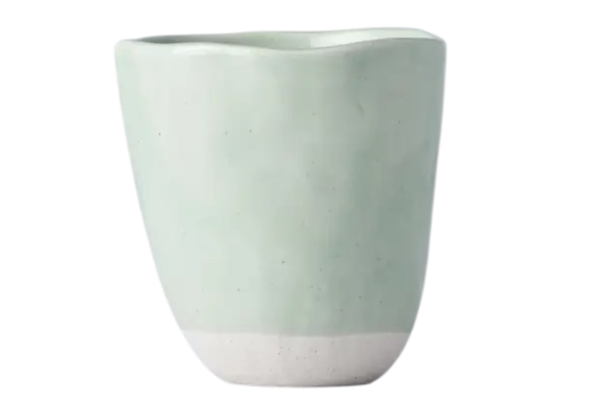 A hand-finished ceramic mug with a softly irregular form and pale tomei blue glaze set against a white background.