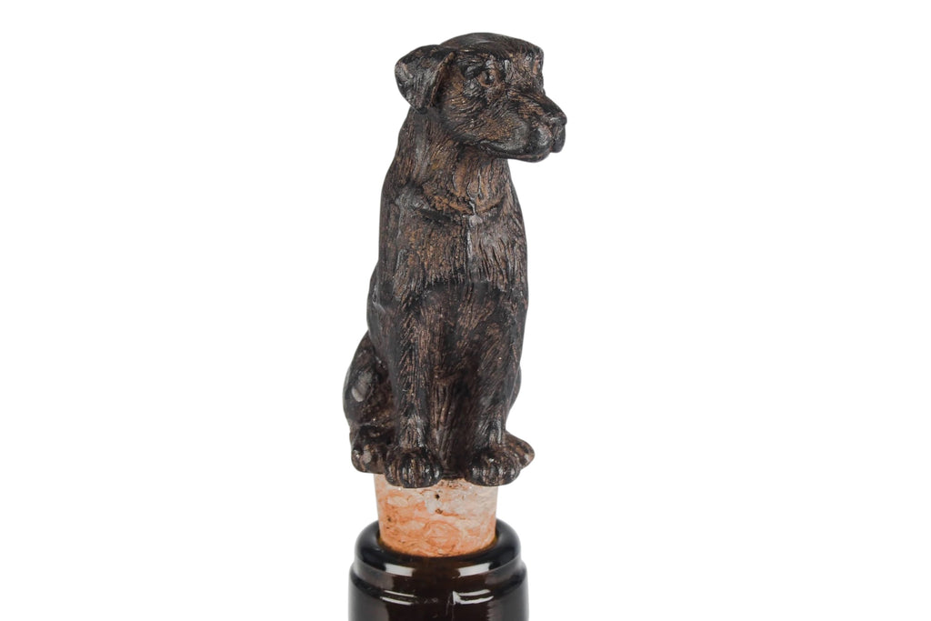 Dog-shaped bottle stopper on a white background