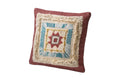 A 45 x 45cm cotton cushion with layered embroidery and a calm, multi-tonal palette. Set against a white background.