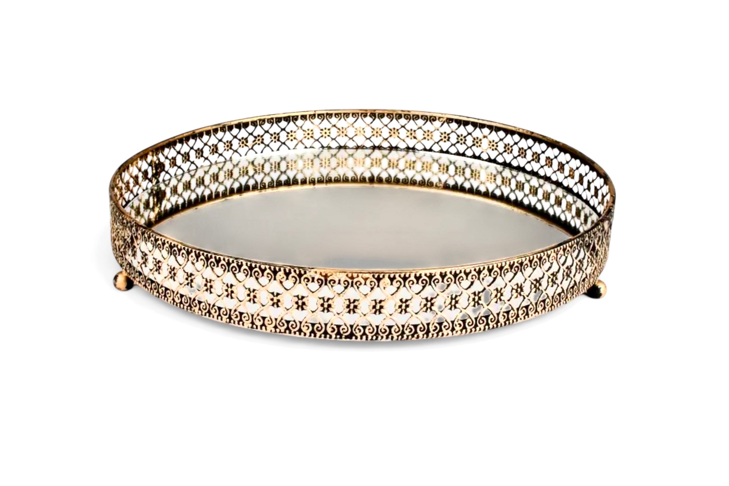 A round metal tray with a mirrored base and decorative detailing on a white background.