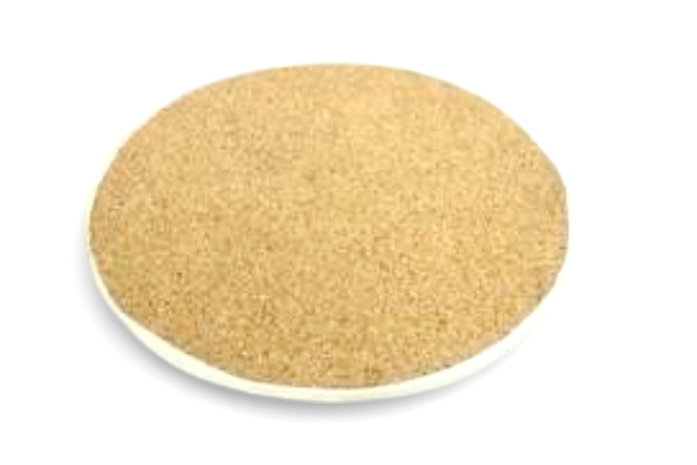 The cork covered reverse side of a round botanical design placemat, on a white background.