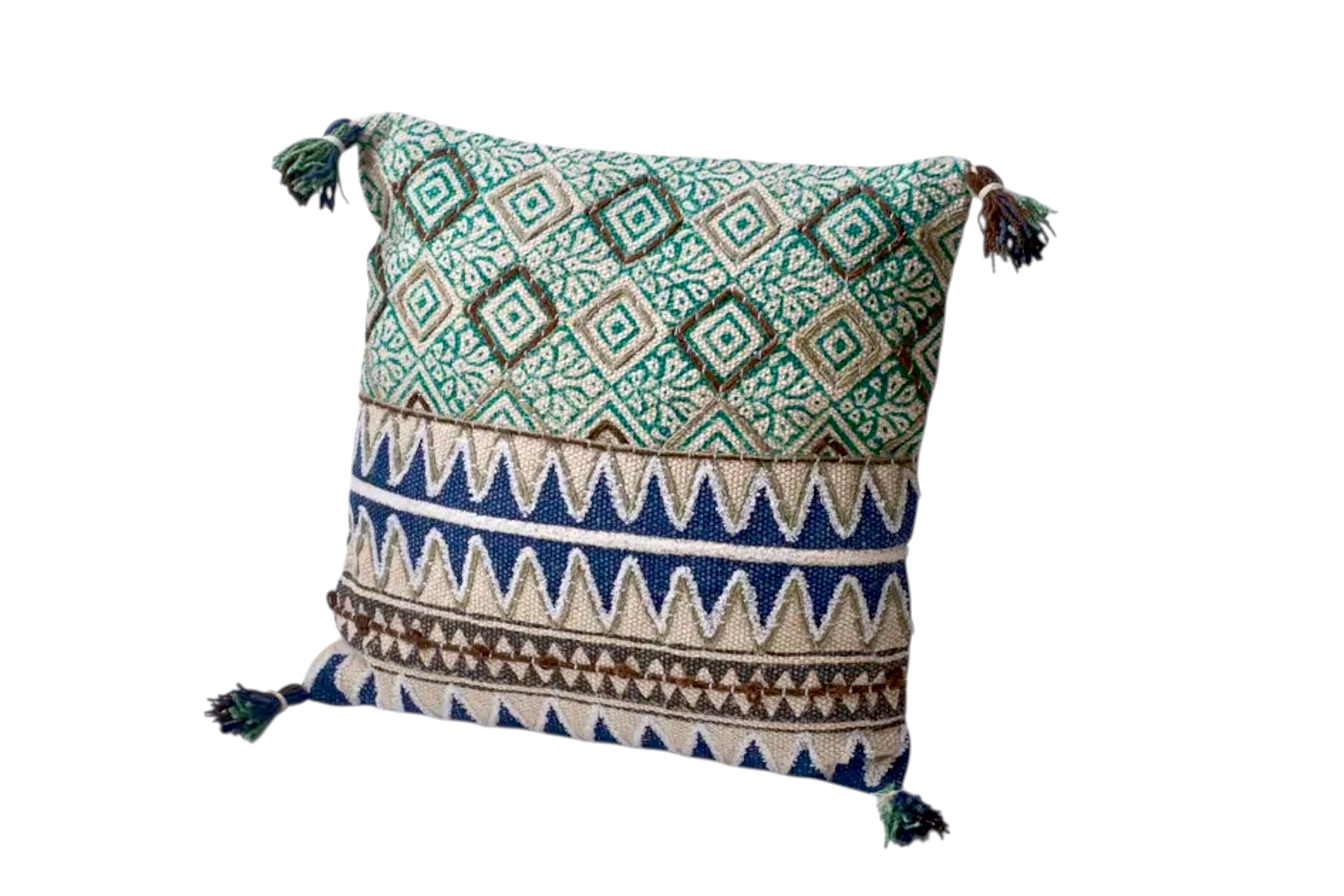 A square embroidered cushion with a teal coploured geometric design on a white background.