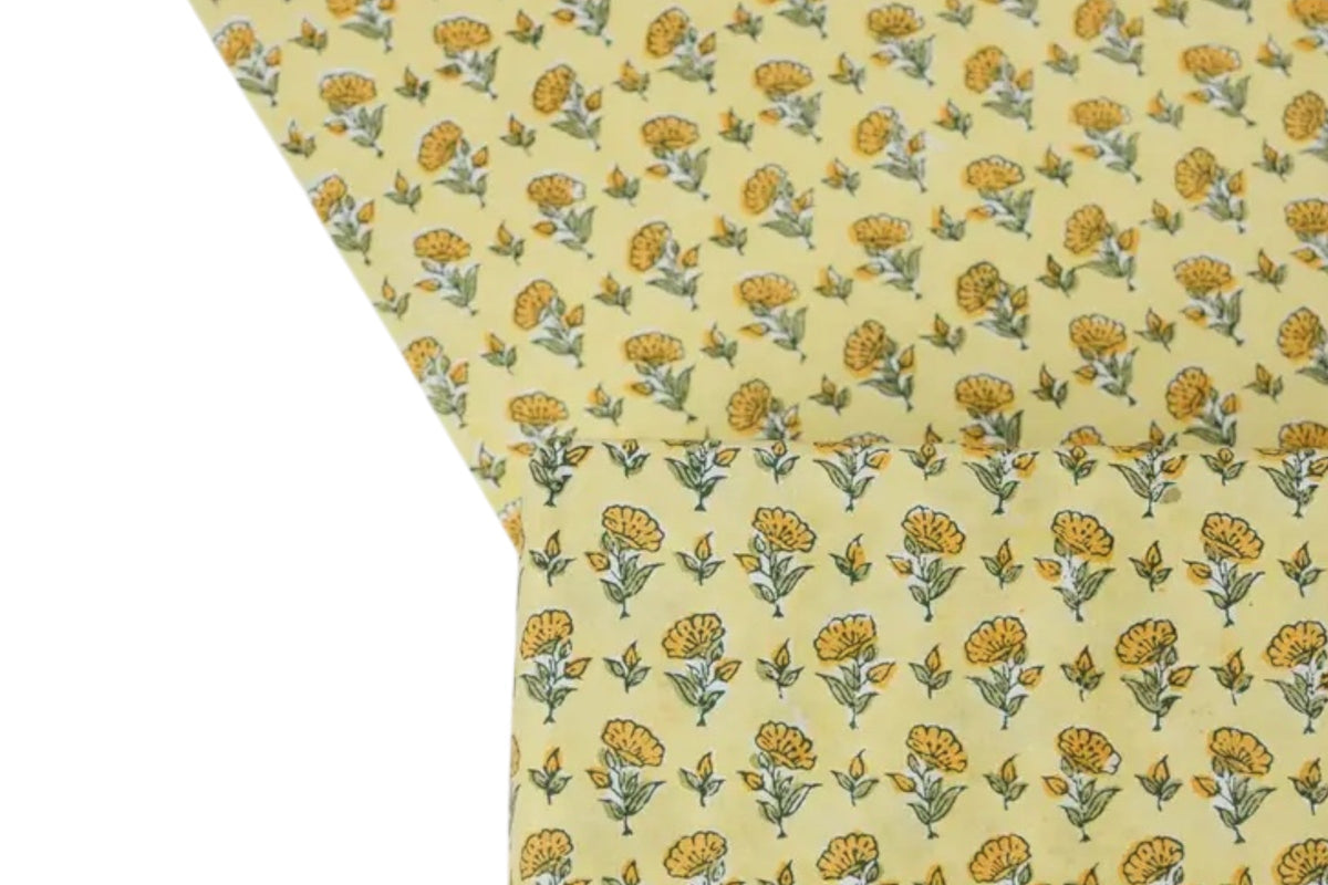 FINCHCRAFT sunshine yellow cotton wrapping paper with a hand block printed ditsy floral pattern